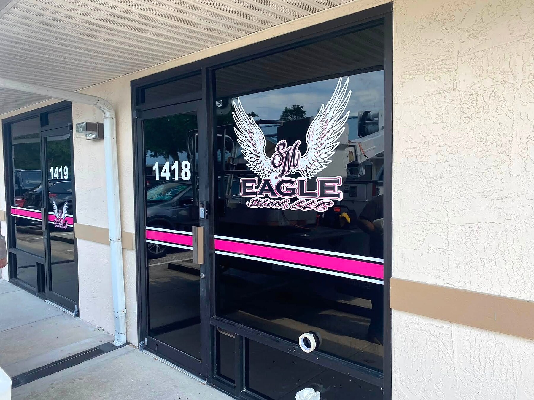 Eagle Steel storefront window decals