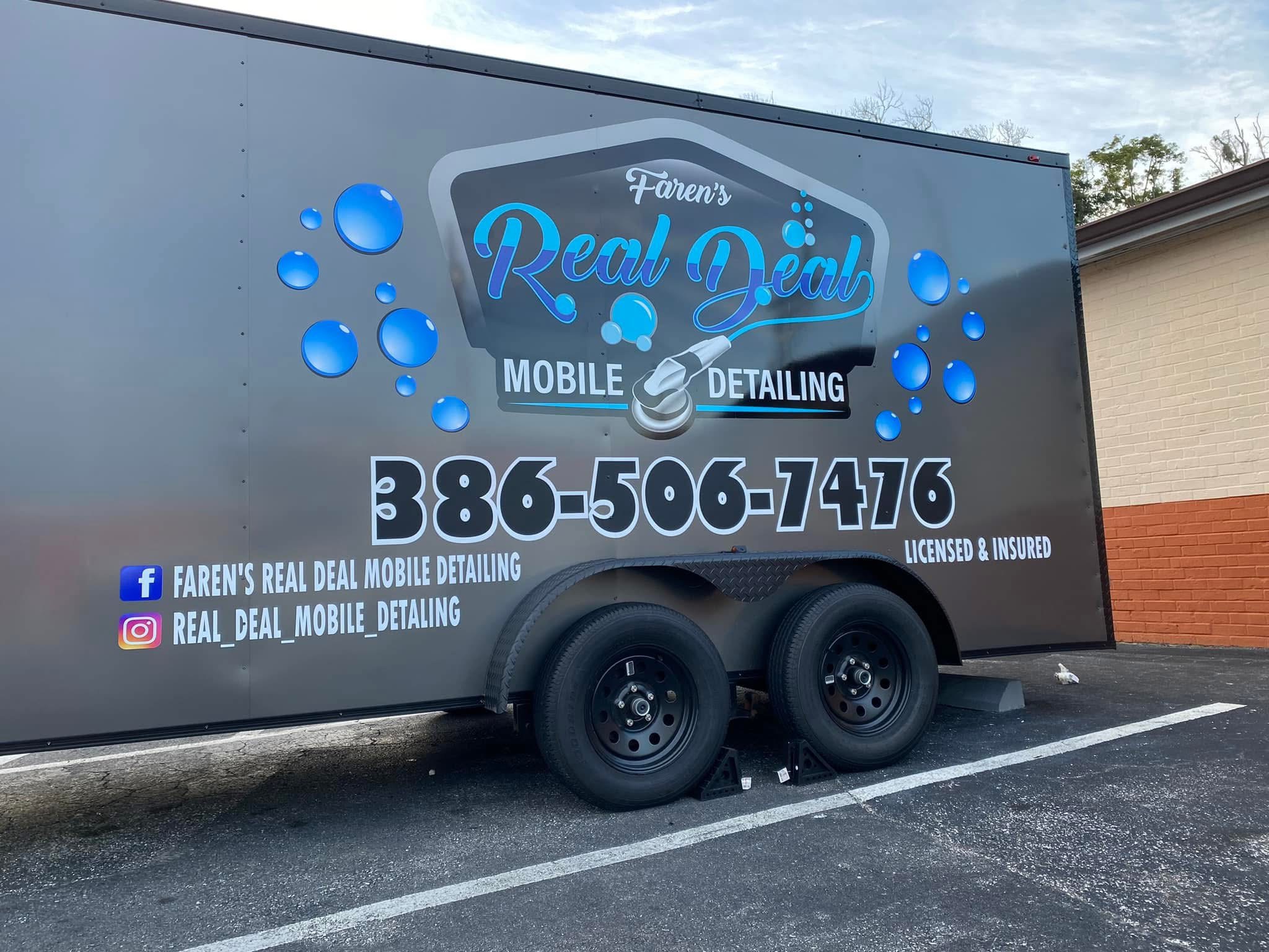 Complete Real Deal Mobile Detailing trailer with graphics